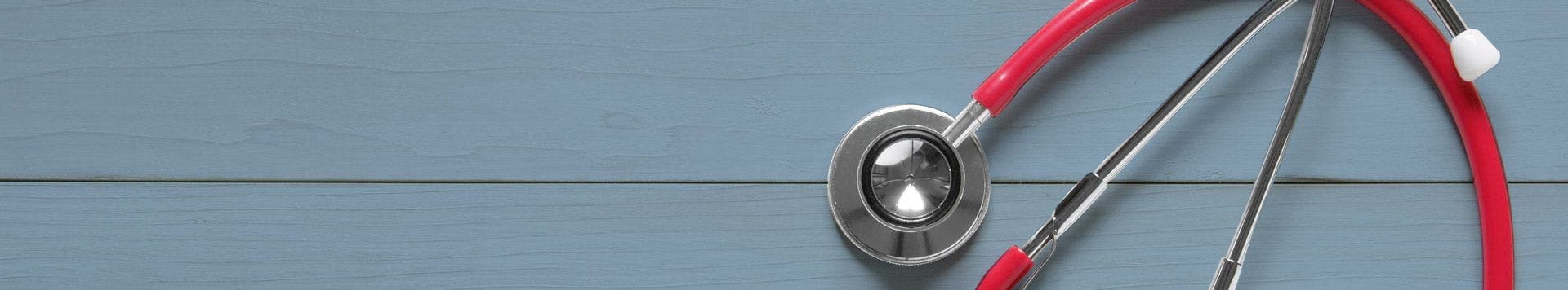 Stethoscope on a banner symbolising medical negligence claims at JMW Solicitors